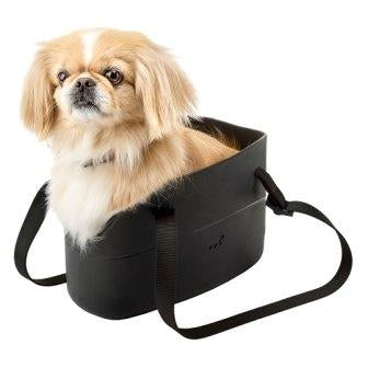 Borsa in resina per il trasporto di cani di piccola taglia, disponibile in diversi colori.